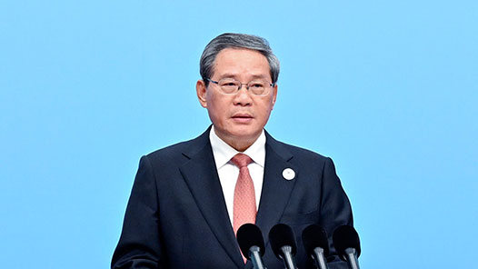 兩會新華社快訊：國務(wù)院總理李強(qiáng)代表國務(wù)院向十四屆全國人大四次會議作政府工作報告